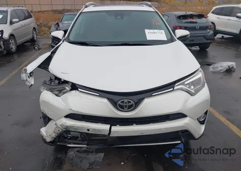 2016 Toyota Rav4 Limited z USA, uszkodzony, nr VIN 2T3DFREV4GW436316